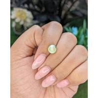 1.80 Ct. Yellowish Green Cabochon Chrysoberyl from Ceylon (Sri Lanka) Life Style