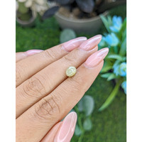 1.71 Ct. Greenish Yellow Cabochon Chrysoberyl from Ceylon (Sri Lanka) Life Style