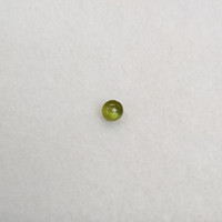 0.65 Ct. Greenish Yellow Cabochon Chrysoberyl from Ceylon (Sri Lanka) Life Style