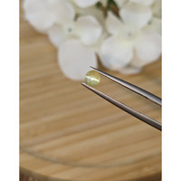 0.63 Ct. Yellow Cabochon Chrysoberyl from Ceylon (Sri Lanka) Life Style