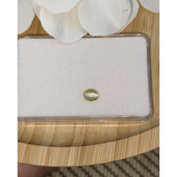 0.75 Ct. Greenish Yellow Cabochon Chrysoberyl from Ceylon (Sri Lanka) Life Style