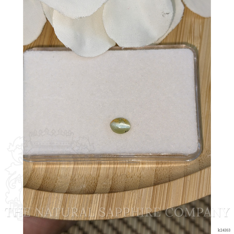 0.75 Ct. Greenish Yellow Cabochon Chrysoberyl from Ceylon (Sri Lanka)