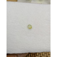 0.55 Ct. Greenish Yellow Cabochon Chrysoberyl from Ceylon (Sri Lanka) Life Style