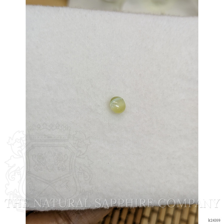0.55 Ct. Greenish Yellow Cabochon Chrysoberyl from Ceylon (Sri Lanka)