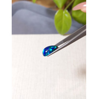 4.15 Ct. Multi Color Cabochon Black Opal from Ethiopia Life Style
