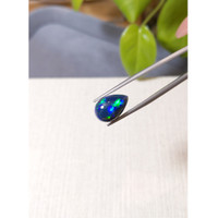 4.15 Ct. Multi Color Cabochon Black Opal from Ethiopia Life Style