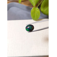 4.95 Ct. Multi Color Cabochon Black Opal from Ethiopia Life Style