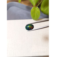 4.95 Ct. Multi Color Cabochon Black Opal from Ethiopia Life Style