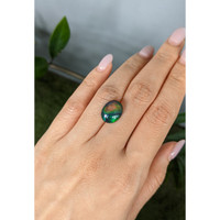 3.44 Ct. Multi Color Cabochon Black Opal from Ethiopia Life Style