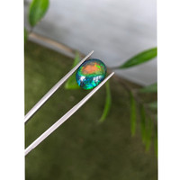 3.44 Ct. Multi Color Cabochon Black Opal from Ethiopia Life Style