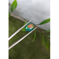 3.44 Ct. Multi Color Cabochon Black Opal from Ethiopia Life Style