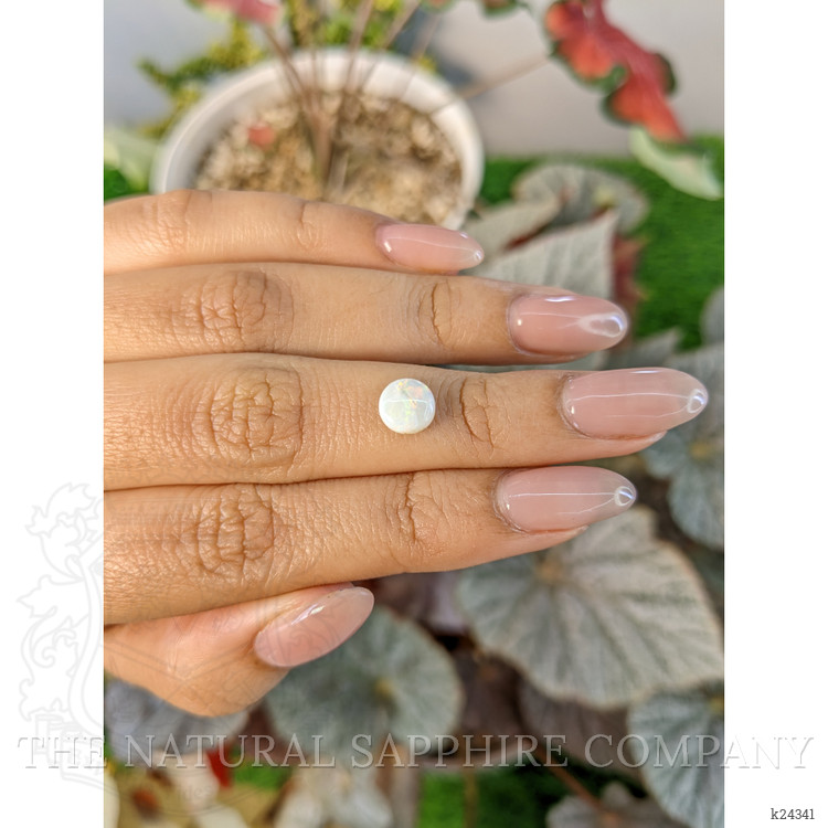 0.83 Ct. Multi Color Cabochon White Opal from Brazil