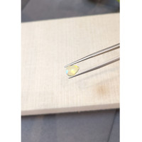 1.31 Ct. Multi Color White Opal from Ethiopia Life Style