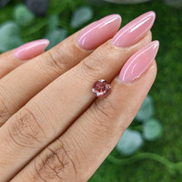 0.73 Ct. Orangish Pink Malaya Garnet from Tanzania Life Style