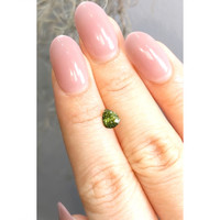 0.75 Ct. Demantoid Garnet from Madagascar Life Style