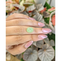 5.15 Ct. Yellowish Green Cabochon Jade from Burma (Myanmar) Life Style