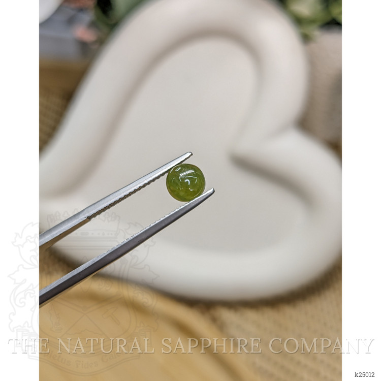 0.80 Ct. Yellowish Green Cabochon Jade from Burma (Myanmar)