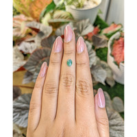 0.76 Ct. Bluish Green Cabochon Jade from Burma (Myanmar) Life Style