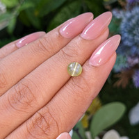 1.55 Ct. Yellowish Green Cabochon Chrysoberyl from Tanzania Life Style