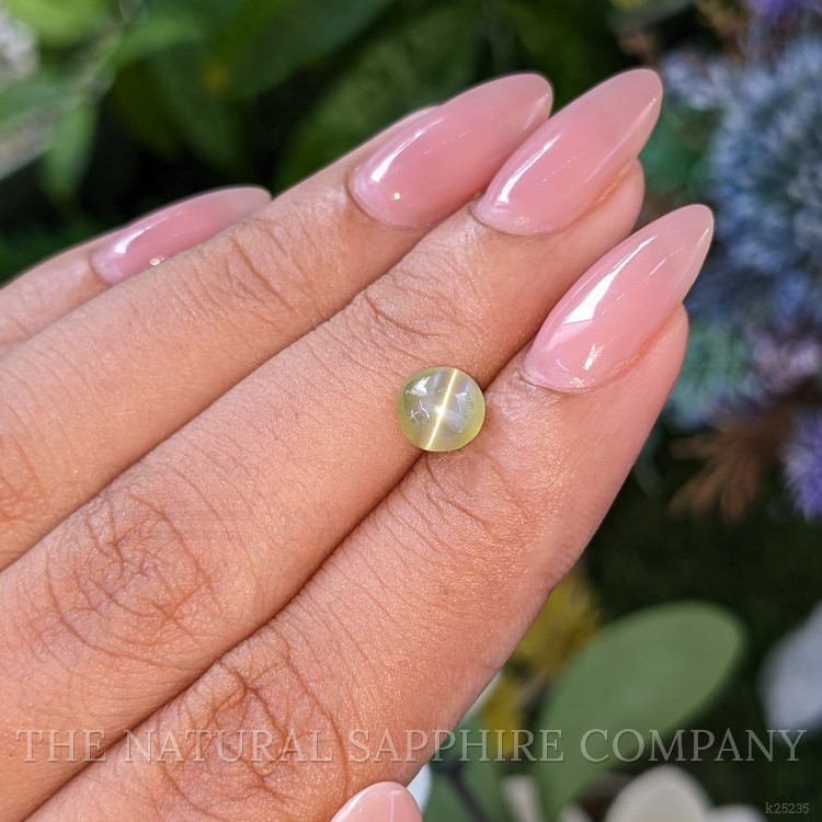 1.55 Ct. Yellowish Green Cabochon Chrysoberyl from Tanzania