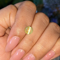 2.06 Ct. Yellowish Green Cabochon Chrysoberyl from Tanzania Life Style