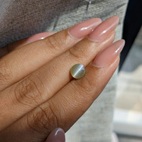 1.58 Ct. Yellowish Green Cabochon Chrysoberyl from Tanzania Life Style