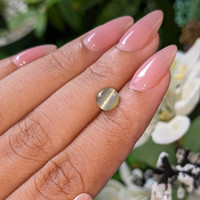 1.58 Ct. Yellowish Green Cabochon Chrysoberyl from Tanzania Life Style