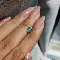 1.03 Ct. Yellowish Green Cabochon Chrysoberyl from Tanzania Life Style