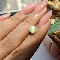 2.27 Ct. Yellowish Green Cabochon Chrysoberyl from Tanzania Life Style