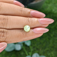 2.27 Ct. Yellowish Green Cabochon Chrysoberyl from Tanzania Life Style