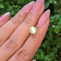 2.27 Ct. Yellowish Green Cabochon Chrysoberyl from Tanzania Life Style