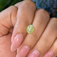 1.88 Ct. Yellowish Green Cabochon Chrysoberyl from Tanzania Life Style