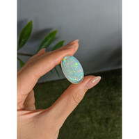 25.85 Ct. Multi Color Cabochon White Opal from Ethiopia Life Style