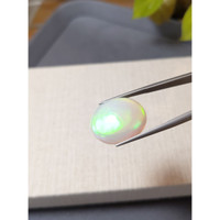22.32 Ct. Multi Color Cabochon White Opal from Ethiopia Life Style