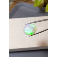 22.32 Ct. Multi Color Cabochon White Opal from Ethiopia Life Style