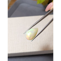 12.76 Ct. Multi Color Cabochon White Opal from Ethiopia Life Style