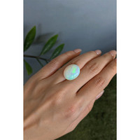 10.05 Ct. Multi Color Cabochon White Opal from Ethiopia Life Style