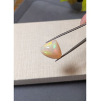 18.51 Ct. Multi Color Cabochon White Opal from Ethiopia Life Style