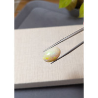 7.02 Ct. Multi Color Cabochon White Opal from Ethiopia Life Style