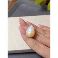 22.46 Ct. Multi Color Cabochon White Opal from Ethiopia Life Style