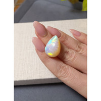 22.46 Ct. Multi Color Cabochon White Opal from Ethiopia Life Style