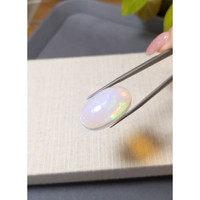 23.91 Ct. Multi Color Cabochon White Opal from Ethiopia Life Style
