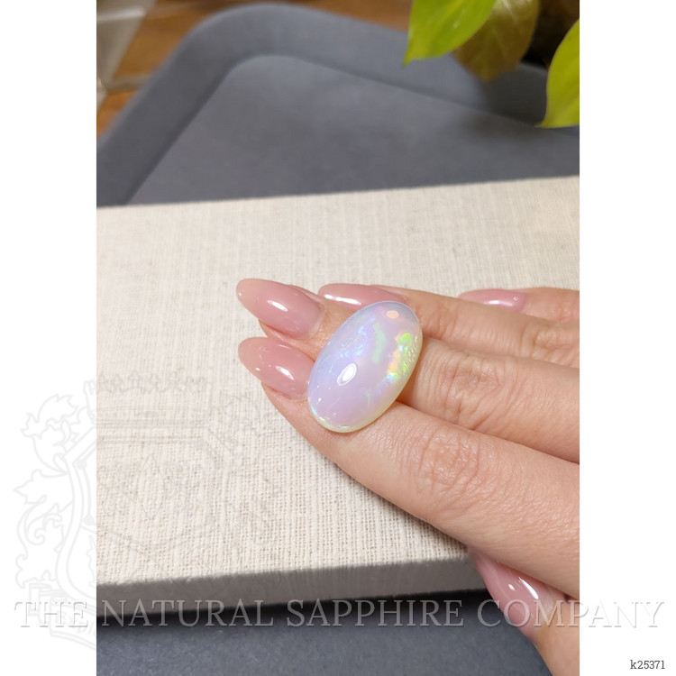 23.91 Ct. Multi Color Cabochon White Opal from Ethiopia