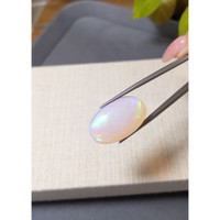 23.91 Ct. Multi Color Cabochon White Opal from Ethiopia Life Style