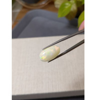 6.77 Ct. Multi Color Cabochon White Opal from Ethiopia Life Style