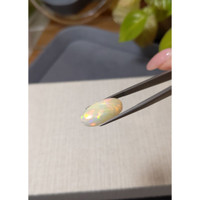 6.77 Ct. Multi Color Cabochon White Opal from Ethiopia Life Style