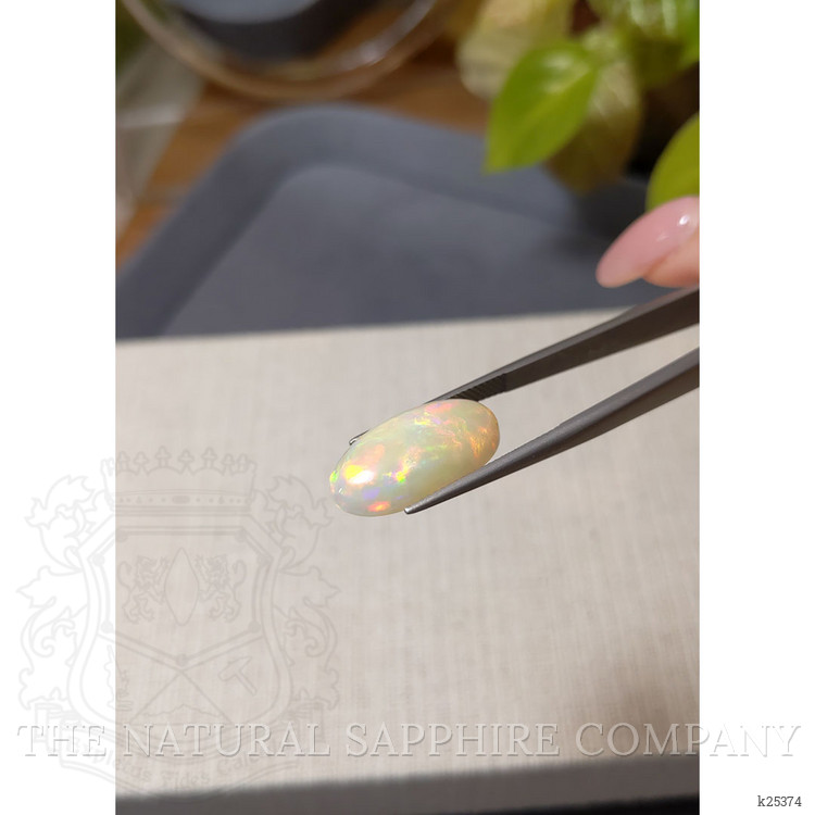6.77 Ct. Multi Color Cabochon White Opal from Ethiopia