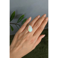 13.78 Ct. Multi Color Cabochon White Opal from Ethiopia Life Style