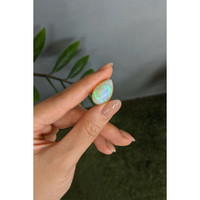13.78 Ct. Multi Color Cabochon White Opal from Ethiopia Life Style