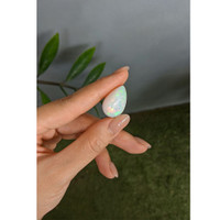 16.98 Ct. Multi Color Cabochon White Opal from Ethiopia Life Style
